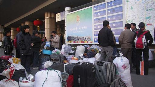 귀향을 준비 중인 농민공. 사진=연합뉴스