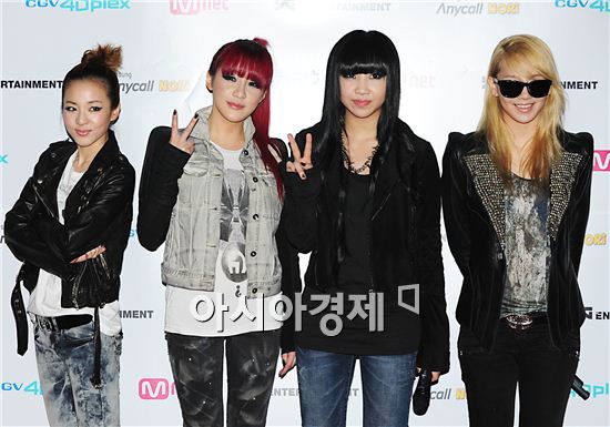 From left, girl group 2NE1 members Sandara Park, Park Bom, Minzy and CL pose during a photocall of their 4D music video showcase at the CJ CGV theater in Yeongdeungpo district of Seoul, South Korea on September 18, 2010. [Park Sung-ki/Asia Economic Daily]