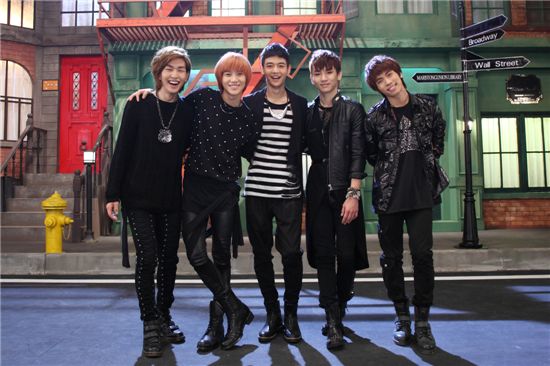 Members of Korean boy band SHINee on the set of their music video "Hello" [SM Entertainment]