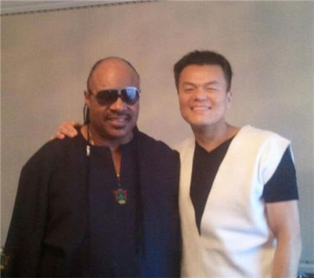 Park Jin-young strikes a pose with Stevie Wonder