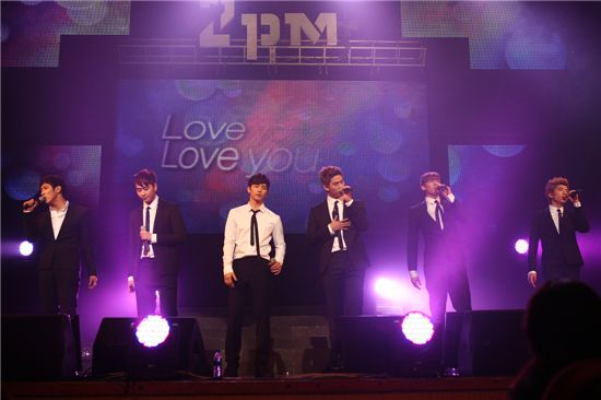 K-pop idols 2PM performing at their 2nd "HOTTEST" fan meeting held at Kwangwoon University in Seoul, South Korea on April 3, 2011. [JYP Entertainment]