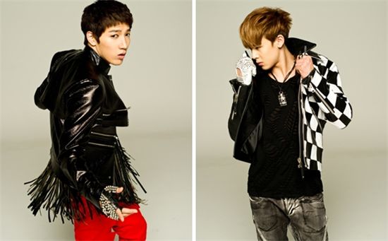 2PM member Junsu (left) and Nichkhun (right) [JYP Entertainment]