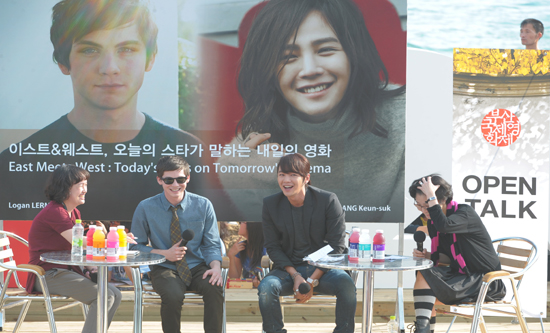 Hollywood actor Logan Lerman and Korean actor Jang Keun-suk take part in an Open Talk session for the 16th Busan International Film Festival (BIFF) held in Busan, South Korea on October 9, 2011. [BIFF]