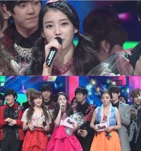 IU kicks off 2012 with 3rd win on SBS' "Inkigayo"
