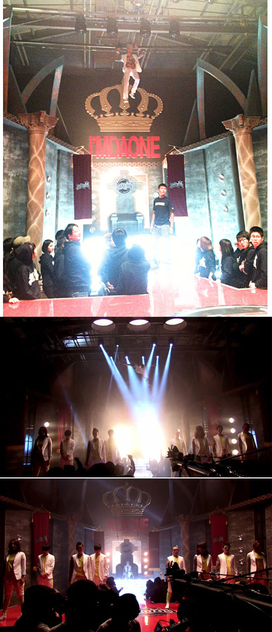 Jo Kwon dangles from ceiling on music video set