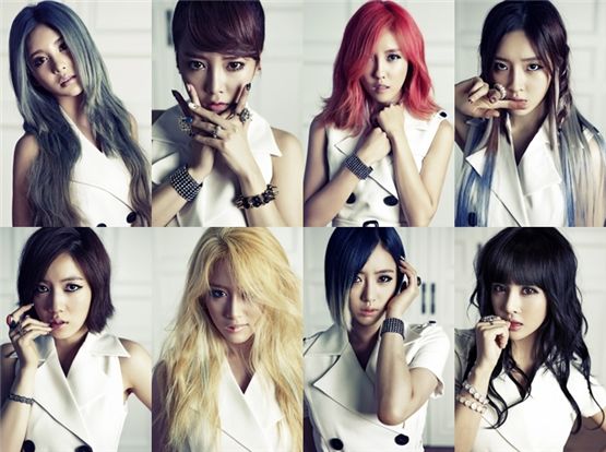 T-ara members Qri (top left), Soyeon (top second to left), Hyomin (top second to right), Areum (top right), Hwa-young (bottom left), Ji-yeon (bottom second to left), Eunjung (bottom second to right), and Boram (bottom right) on the cover of their latest mini album "Day By Day" [Core Contents Media]