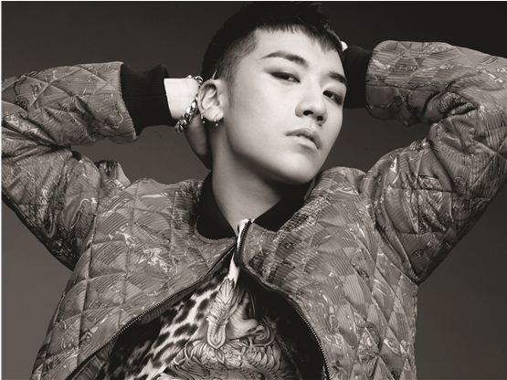 Big Bang's Seungri is posing in front of the camera for their 2012 repackaged album, "Still Alive." [YG Entertainment]