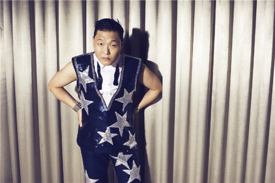 PSY poses in front of the camera before opening his summer concert, "Summer Stand," held at Seoul's Jamsil Sports Complex, South Korea, on August 11, 2012. [Chae Ki-won/10Asia]
