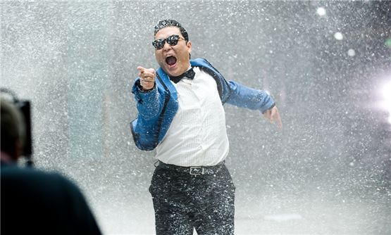 PSY donned in a blue jacket strikes a funny pose for his music video "Gangnam Style" listed in his sixth studio album "Six Rules, Part. 1," dropped on July 15, 2012. [YG Entertainment] 