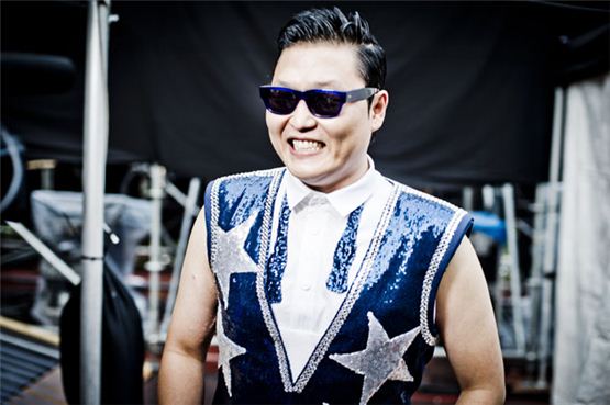 PSY smiles at the camera during his exclusive concert "Summer Stand," opened at Seoul's Jamsil Sports Complex on August 11, 2012. [YG Entertainment]