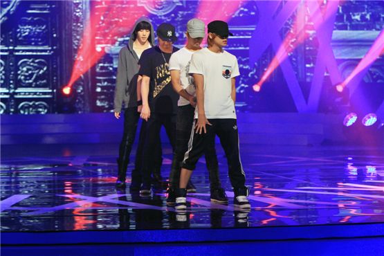 Cheon-dung (left), Seung-ho (second to left), G.O. (second to right) and Mir (right) of boy band MBLAQ line up on the stage during the rehearsal of the seventh Seoul International Drama Awards held at the National Theater of Korea in Seoul on August 30, 2012. [Monica Suk/10Asia]