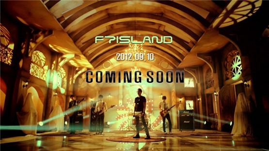 FTisland members pose with their instruments in a group photograph for their teaser video, set to become available online on Septmber 6, 2012. [FNC Entertainment]