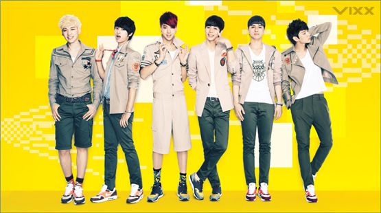 VIXX' Hyuk (left), N (second to left), Ravi (third to left), HongBin (third to right), Ken (second to right) and (right) posing together in a yellow background for the release of their second single "Rock Ur Body" dropped on August 14, 2012. [Jellyfish Entertainment]