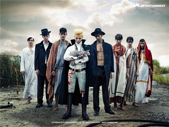 Korean pop icon G-Dragon (fourth to left) pose during the photo shoot of his new album, "ONE OF A KIND," due out online on September 15, 2012. [YG Entertainment]