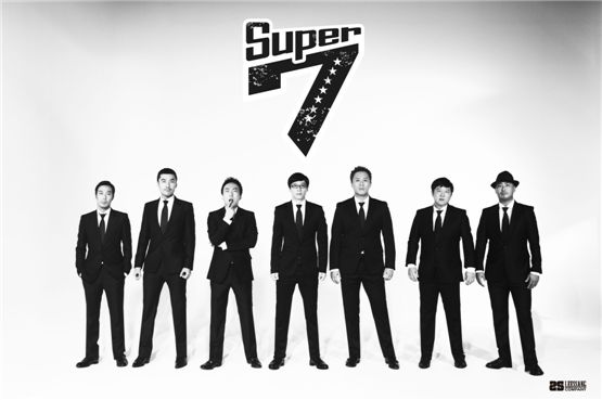 TV personalities Haha (left), No Hong-chul (second to left), Park Myung-soo (third to left), Yoo Jae-suk (center), Jung Joon-ha (third to right), Jung Hyung-don (second to right) and musician Gil (right) pose in the teaser photo for "SUPER 7" concert opening at the Olympic Gymnastics Hall in Seoul, South Korea, on November 24 and 25, 2012. [LeSSang Company]