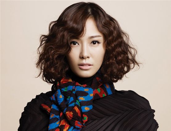 Korean actress Son Tae-young poses in her profile photo released by her agency J.One+ Entertainment on September 14, 2012. [J.One+ Entertainment]