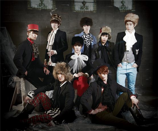 Super Junior-M members Ryeowook (top left), Eunhyuk (top second to left), Kyuhyun (top third to left), Donghae (top third to right), Sungmin (top second to right), Henry (top right), Siwon (bottom left) and  Zhou Mi (bottom right) pose together for their second mini-album "Perfection," dropped on February 28, 2011. [SM Entertainment]