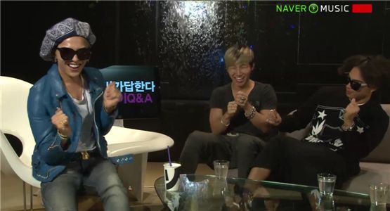 Big Bang members G-Dragon, Daesung and Taeyang laugh together while chatting during the live streaming of "GD FRIENDS LIVE WORLDWIDE" at YG Entertainment's office in Seoul, South Korea, on September 25, 2012. [Naver]