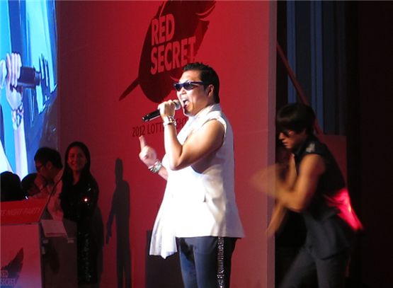 PSY performs for the "2012 LOTTE NIGHT PARTY" held at the Lotte Hotel in Busan, South Korea, on October 6, 2012. [Lee Hye-ji/10Asia]