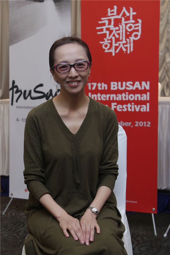 Director Yang Yong-hi poses in front of the reporters at a press conference for "Our Homeland," held at Busan's Haeundae Grand Hotel in South Korea, on October 6, 2012. [BIFF]