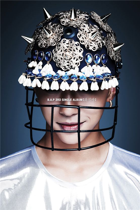 B.A.P member Bang Yong-guk smiles in a hockey helmet for the teaser photo of "Don't" [translated title], set to be dropped on October 23
