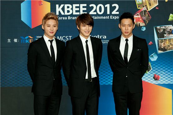 JYJ members Kim Junsu (left), Kim Jae-joong (center) and Park Yuchun (right) pose together during the appointment ceremony of the upcoming Korea Brand & Entertainment Expo[KBEE2012], held at Korea Trade-Investment Promotion Agency's head office in southern Seoul, Korea on October 17, 2012. [Lee Jin-hyuk/10Asia]