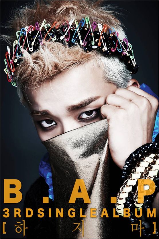 B.A.P member Youngjae covers his face in the teaser photo of "Don't" [translated title], set to become available on October 23, 2012. [TS Entertainment]