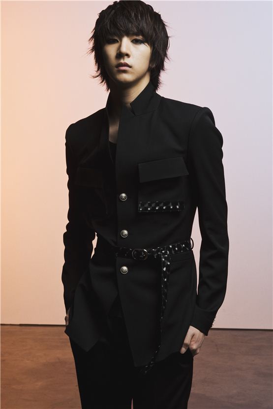 K-pop boy band MBLAQ member Cheon-dung poses in a black costume before an interview with 10Asia. [Chae Ki-won/ 10Asia]