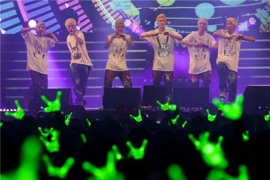 B.A.P members Zelo (left), Dae-hyun (second to left), Bang Yong-guk (third to left), Young-jae (third to right), Him Chan (second to right) and Jong-up (right) perform "Crush" during the group's first fan club inauguration day titled "1st BABY DAY," held at Seoul's Korea University Hwajeong Gymnasium in Korea on October 28, 2012. [Brandon Chae/10Asia]