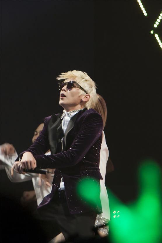 Him Chan shows PSY's horse-riding dance, performing "Gangnam Style" during the group's first fan club inauguration day titled "1st BABY DAY," at Seoul's Korea University Hwajeong Gymnasium in Korea on October 28, 2012. [Brandon Chae/10Asia]