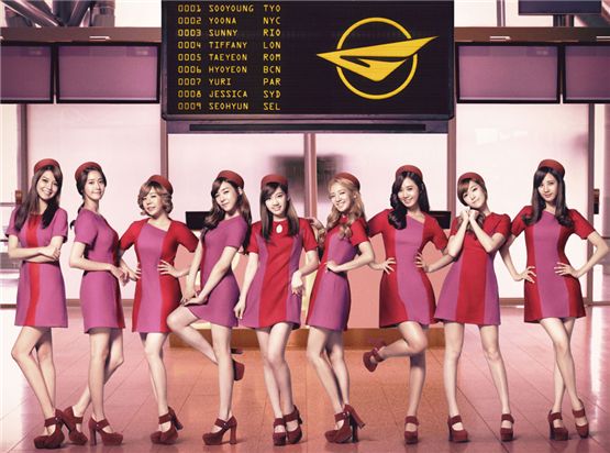 GIrls' Generation members Sooyoung (left), Yoona (second to left), Sunny (third to left), Tiffany (fourth to left), Taeyeon (center), Hyoyeon (fourth to right), Yoori (third to right), Jessica (second to right) and Seohyun (right) pose together in a teaser image of their second full-length Japanese album "GIRLS GENERATION II~Girls & PEACE~," set to hit stores on November 28, 2012. [Girls' Generation official Japanese website]