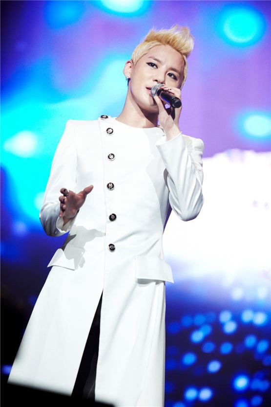 JYJ member Kim Junsu performs on stage during his first world tour which will round off at Turbinenhalle in Oberhausen, Germany on November 30, 2012. [C-Jes Entertainment]