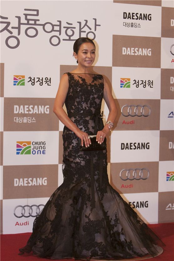 Venice-winning pic "Pieta" actress Cho Min-soo poses in front of the photo wall at the 33th Blue Dragon Film Awards ceremony held at the Sejong Center in Seoul, South Korea on November 30, 2012. [10Asia/ Brandon Chae]