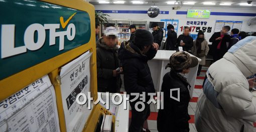 '로또 현금 금지'…"전자카드제 도입?"