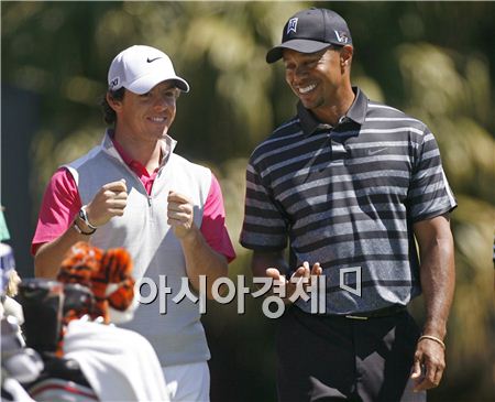  세계랭킹 1, 2위 타이거 우즈(오른쪽)와 로리 매킬로이. 사진=Getty images/멀티비츠.