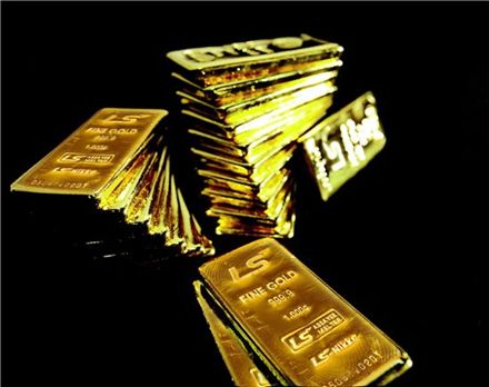 버냉키 쇼크로 추락한 금값.."더 떨어진다"