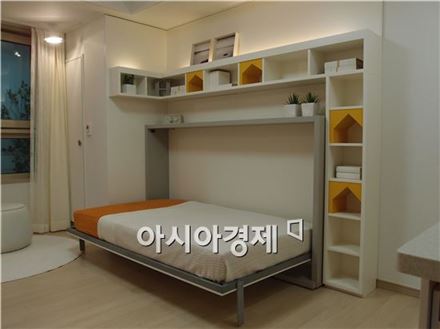 행복을 꽉 '채움'… 두산건설, 공간을 확 비움