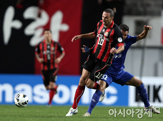 [포토] 데얀 '이란축구 거친데~'