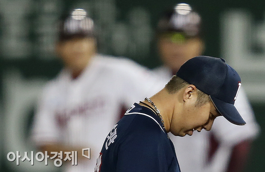[포토] 유희관 '피안타 하나가 아쉬운 날'