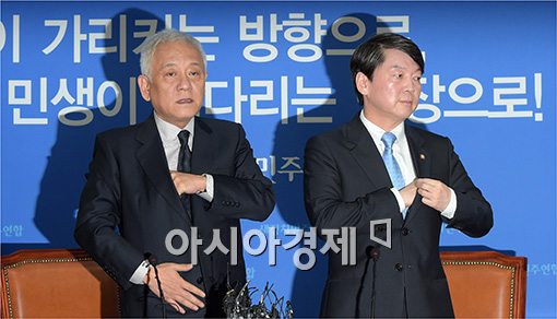 [포토]기자회견 마친 김한길·안철수 공동대표