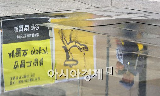 세월호 현수막 집단 설치가 불법 광고대행업?