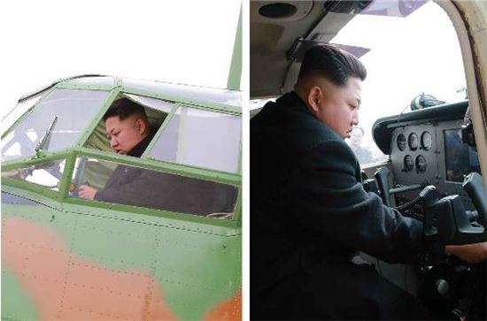북한, 비행기 생산 공장 공개…김정은 직접 성능 점검