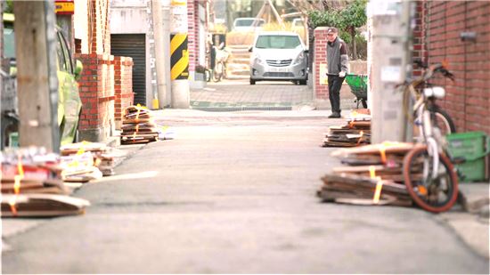 HS애드, 폐지수거 노인 위한 ‘오렌지 리본’ 캠페인 재능기부