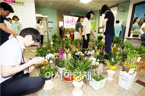 광주시 광산구 공직자들, 승진 기쁨 나눔으로 두 배 