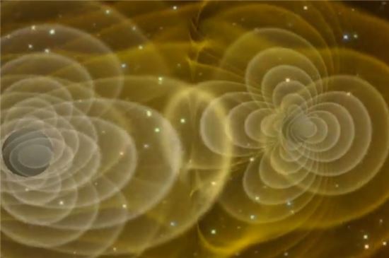▲두 개의 블랙홀이 합병되면서 중력파가 방출되는 시뮬레이션.[사진제공=NASA]