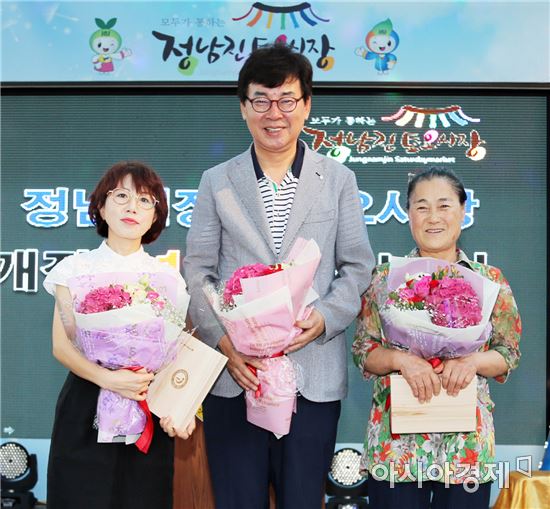 개장 11주년 장흥토요시장의 興!, 빗속을 달구다.