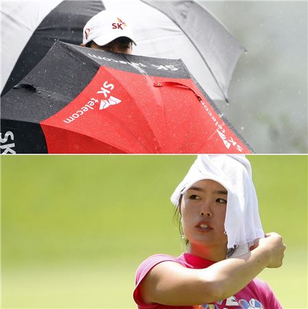 여름철 골프의 화두는 악천후에 순응하는 방법이다. 홍순상이 우산으로 비를 피하는 장면(위)과 안젤라 박이 수건으로 더위를 식히는 모습.