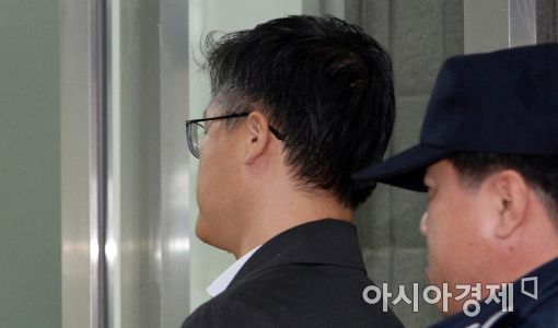 [포토]조사 받으러 가는 정호성