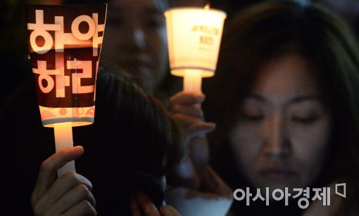 [11·12 촛불집회]거리의 시민들 "아이에게 부끄럽지 않기 위해 촛불 들었다"