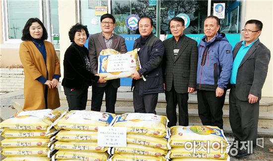 서영암농협 박영수 이사, 미암면지역사회보장협의체 쌀 20포 기탁